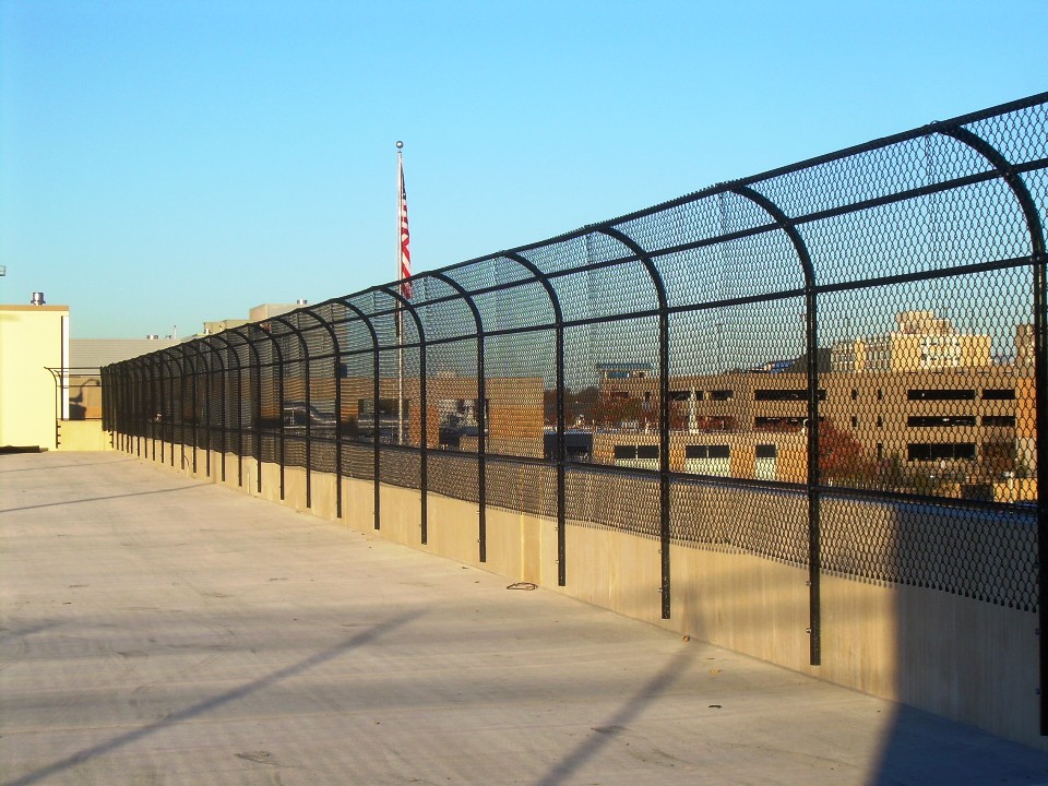 Industrial / Commercial Chain Link Fence - curved vinyl coated chain link fence - VA Medical Center Parking Garage - Columbia, Missouri