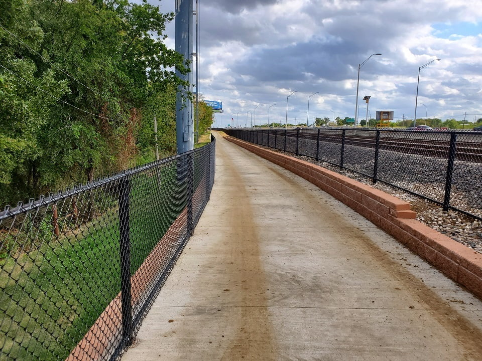 Commercial Chain Link - black chain link fencing - A-Train Bike and Pedestrian Trail - Lewisville, Texas