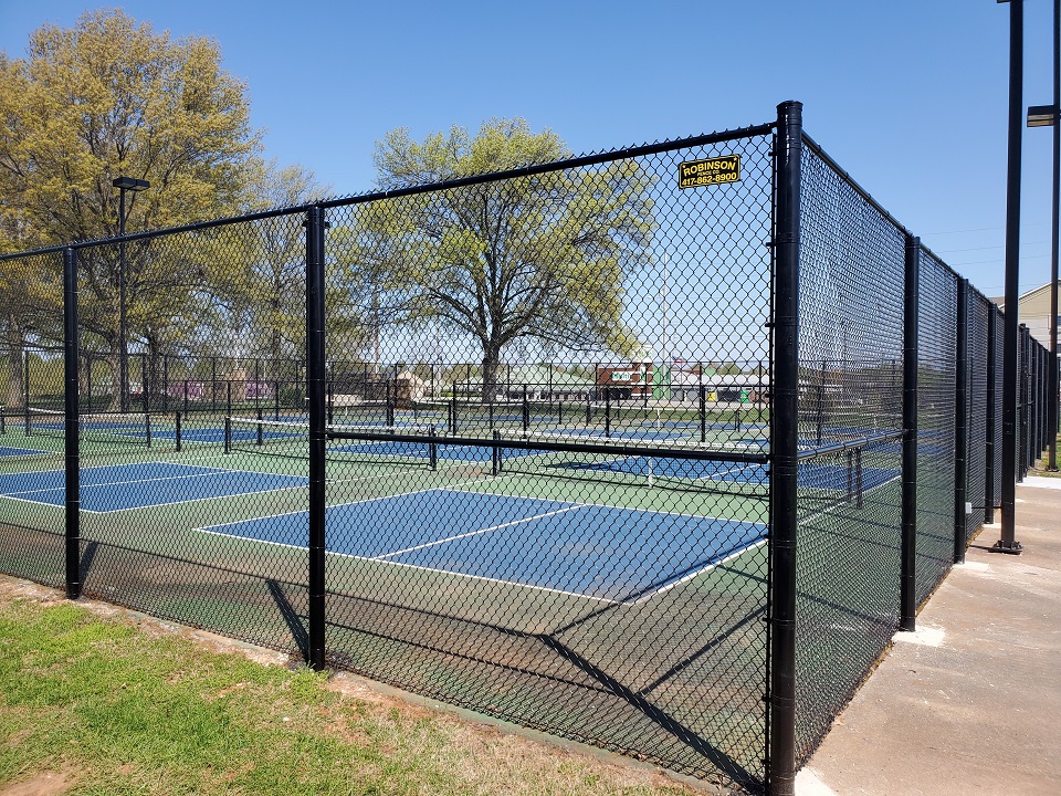 Commercial black vinyl chain link fencing - Twin Oaks Country Club - tennis courts Springfield, Missouri
