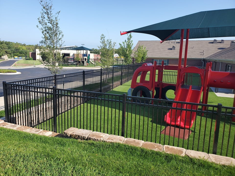 Ornamental Fencing - black ornamental steel, vinyl coated chain link, vinyl privacy fence - Primrose School at KU Medical Center - Kansas City, Kansas