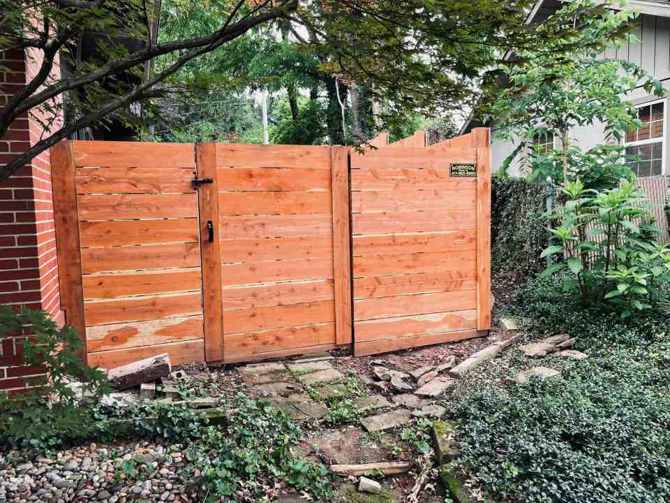 Custom Eastern Red Cedar Wood Fence - horizontal fence with custom cantilever gate