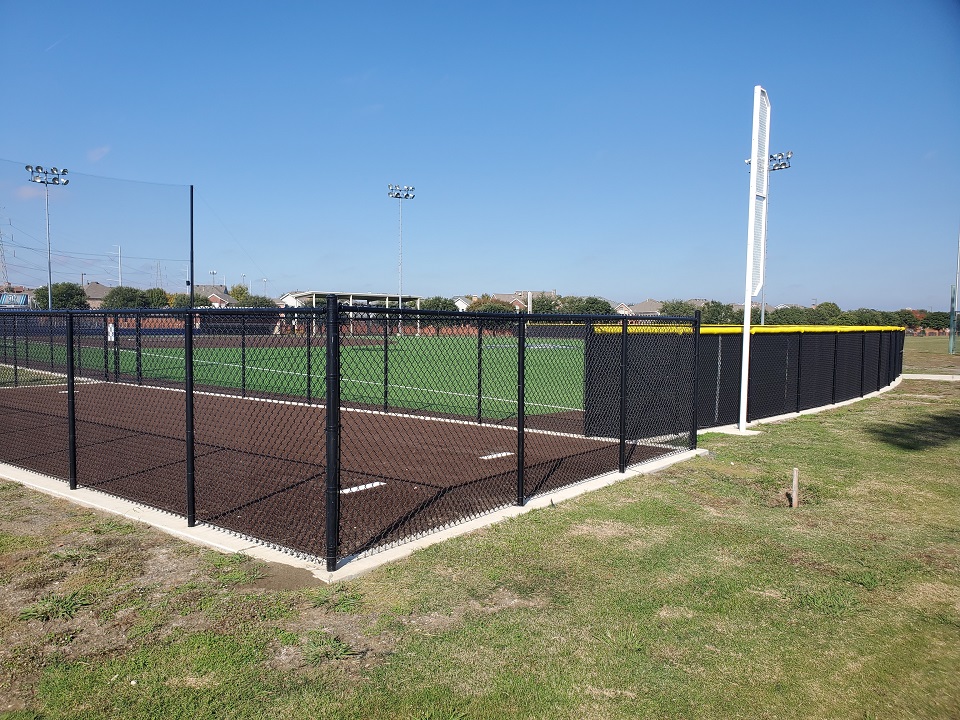 Commercial Fence - black vinyl coated chain link - Ranchview High School Baseball and Track fence - Carrollton, Texas