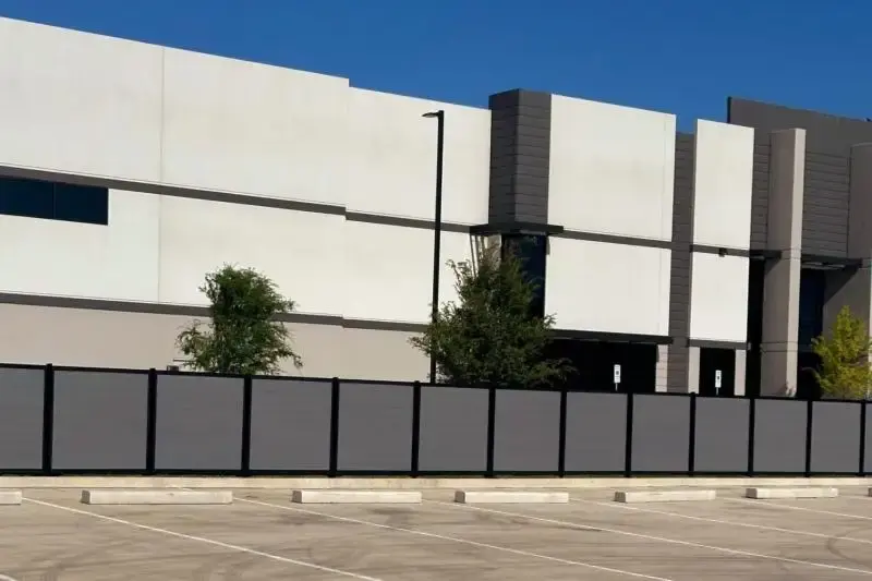 FenceTrac privacy fence with grey infill - TOLEAD Logistics Warehouse - Irving, Texas