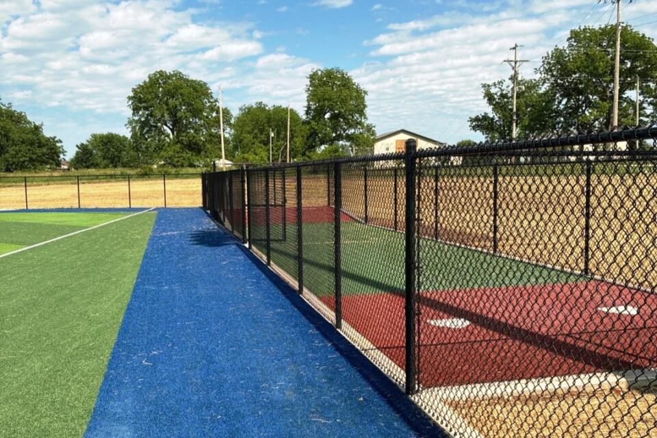 Commercial chain link fence, black vinyl coated - Marionville High School - Marionville, Missouri