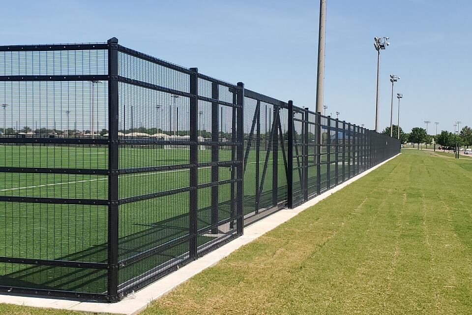 anti-climb fence, cantilever gates, chain link backstops - Russell Creek Park - Plano, Texas