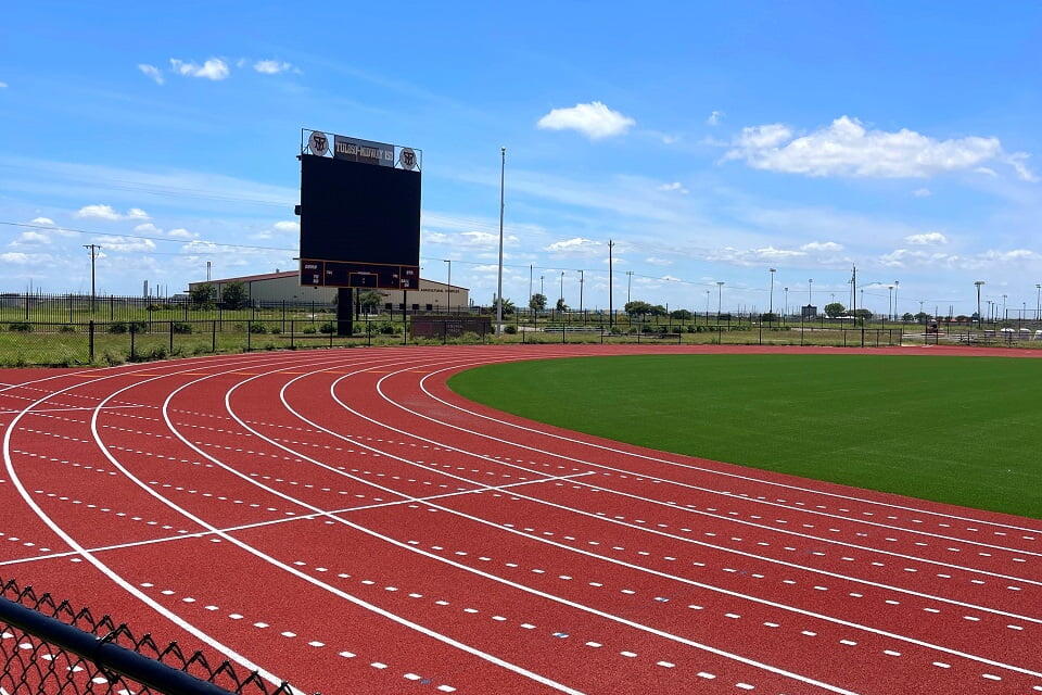 Black vinyl coated chain link fence - Tuloso High School - Corpus Christi, Texas